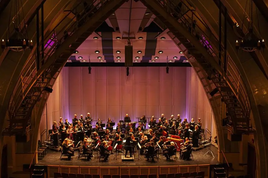 The Carmel Bach Festival orchestra and chorale on stage at Sunset Center
